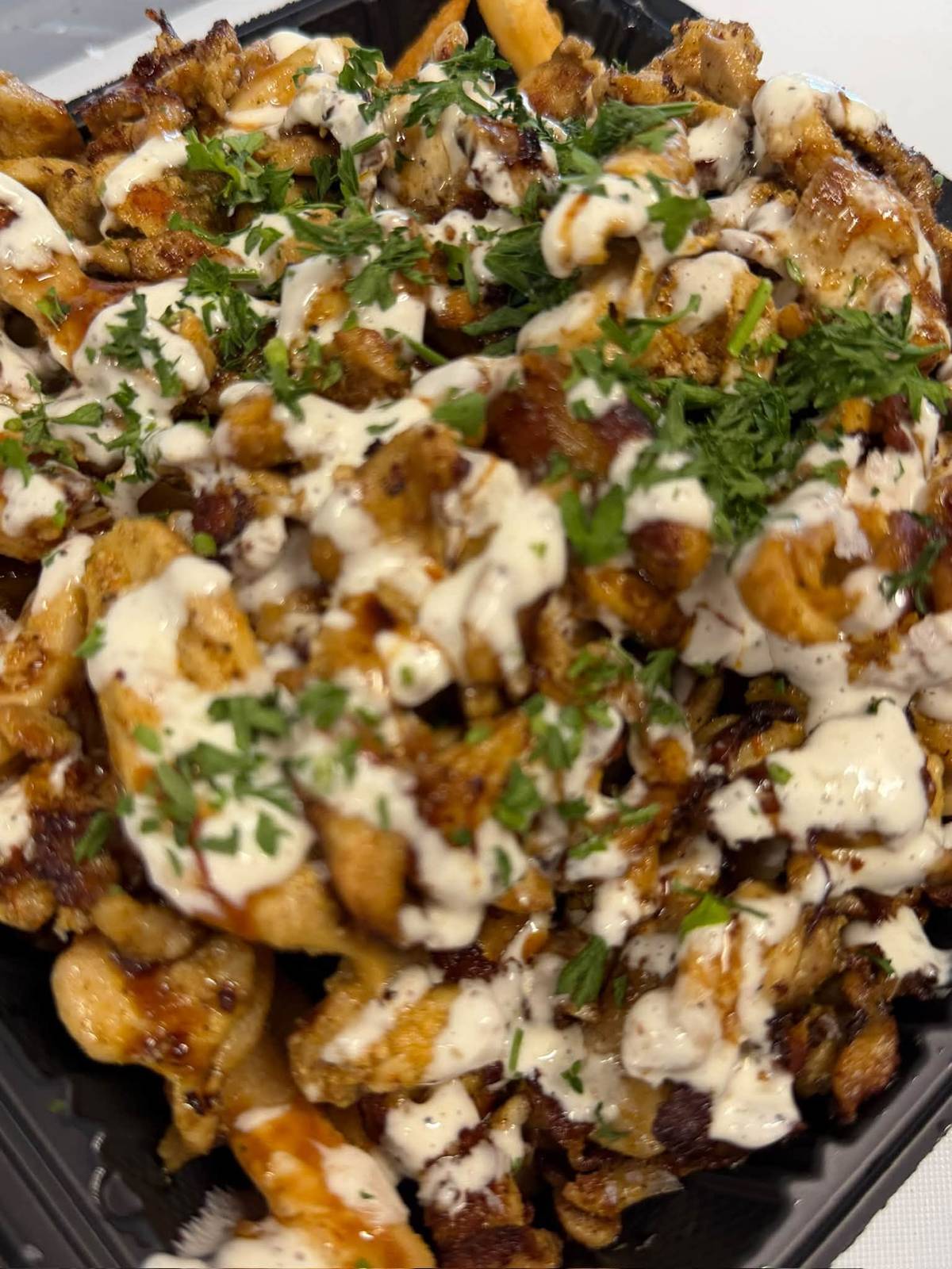 Gyro with grilled meat, tomatoes, onions and tzatziki from Mezze Street Kitchen