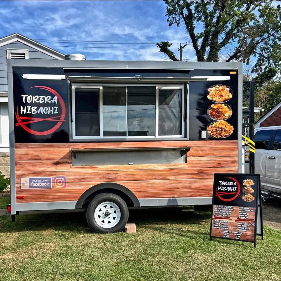 Torera Hibachi food truck with its circular logo painted on the side