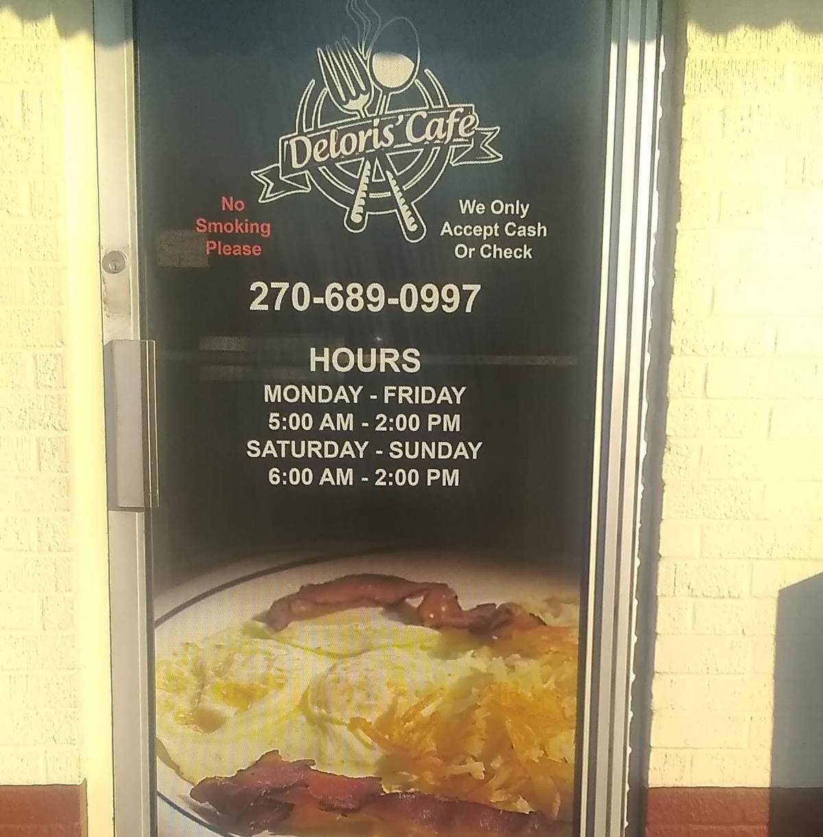 Deloris' Cafe logo on the restaurant's front door